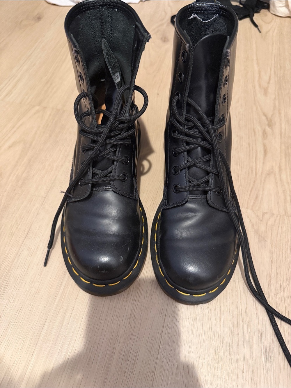 Dr. Martens Black Leather Boots with Yellow Stitching